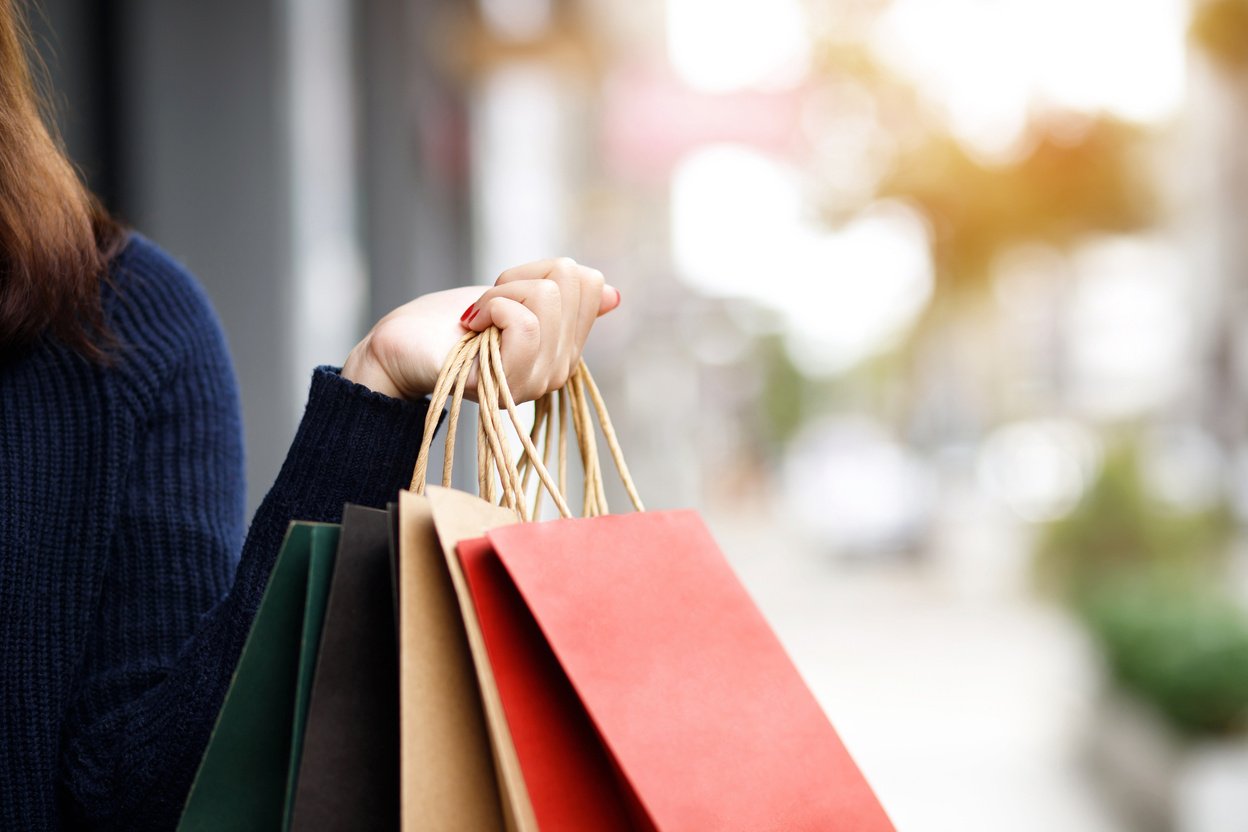 Women Holding Shopping Bags